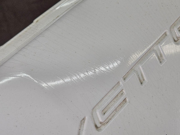 1997-04 C5 Corvette Front Bumper License Plate Filler Panel, White - OEM5