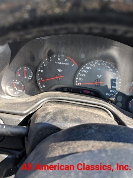 6751589