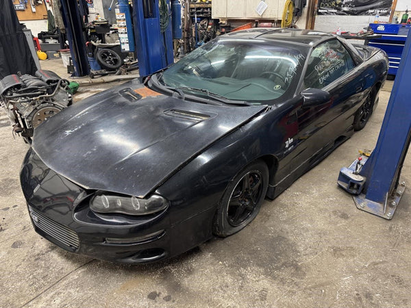 6750975