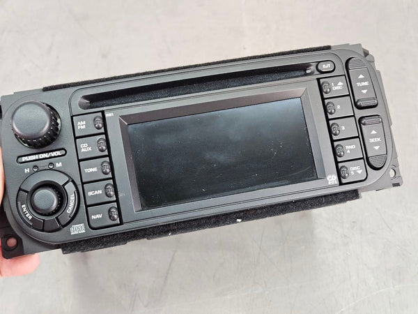 2004-07 Chrysler, Dodge, Jeep AM/FM/CD/Nav Factory Radio Assembly, 56038629AH4