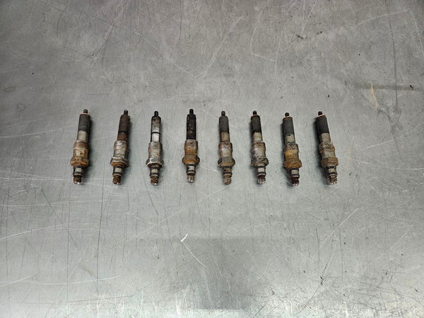 1988-91 Ford F250 F350 E250 7.3L IDI Diesel Fuel Injector Set of 8 - OEM 0