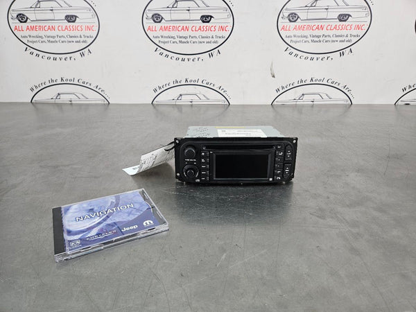 2004-07 Chrysler, Dodge, Jeep AM/FM/CD/Nav Factory Radio Assembly, 56038629AH0