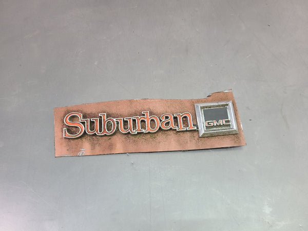 1973-80 GMC Suburban Rear Tailgate 'Suburban' Emblem Badge Ornament - OEM0