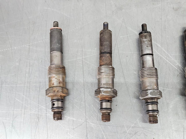 1988-91 Ford F250 F350 E250 7.3L IDI Diesel Fuel Injector Set of 8 - OEM 1